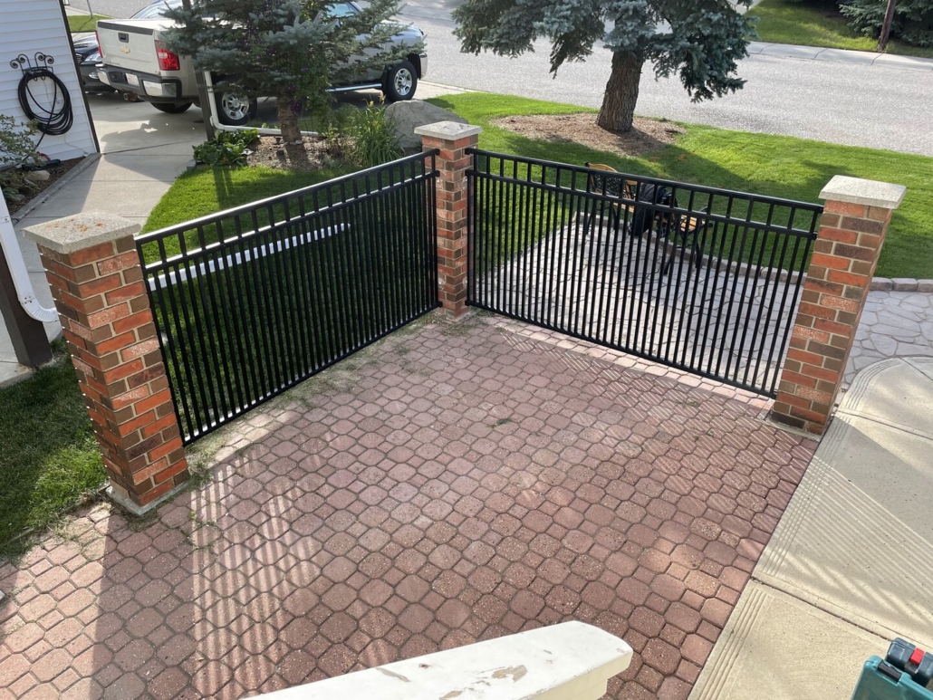 Ornamental Fence with brick pillars