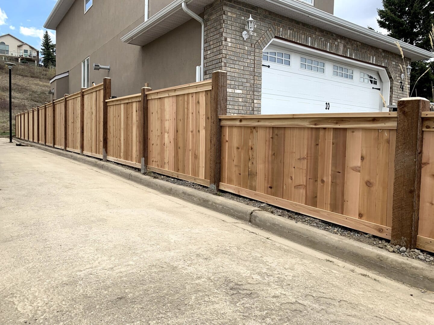 Wood fence on a hill
