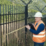 Fence with barbed wire