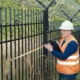 Fence with barbed wire