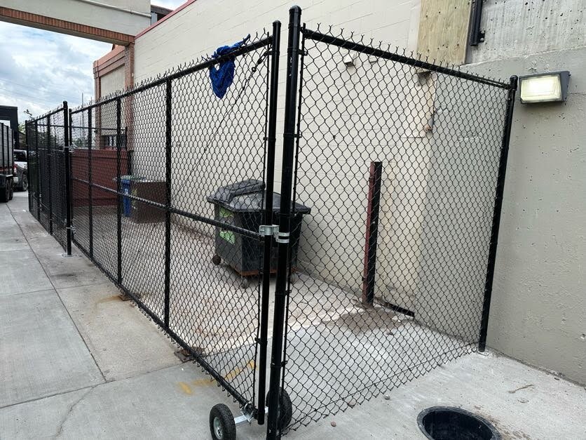 Chain link fence with a gate